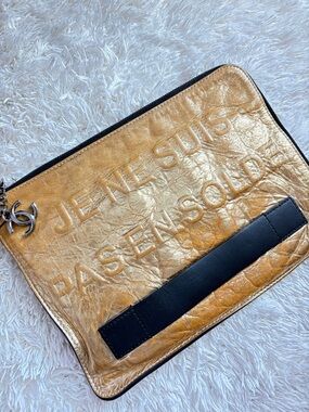 CHANEL Quilted Black Leather Interior with Gold Plate Detail